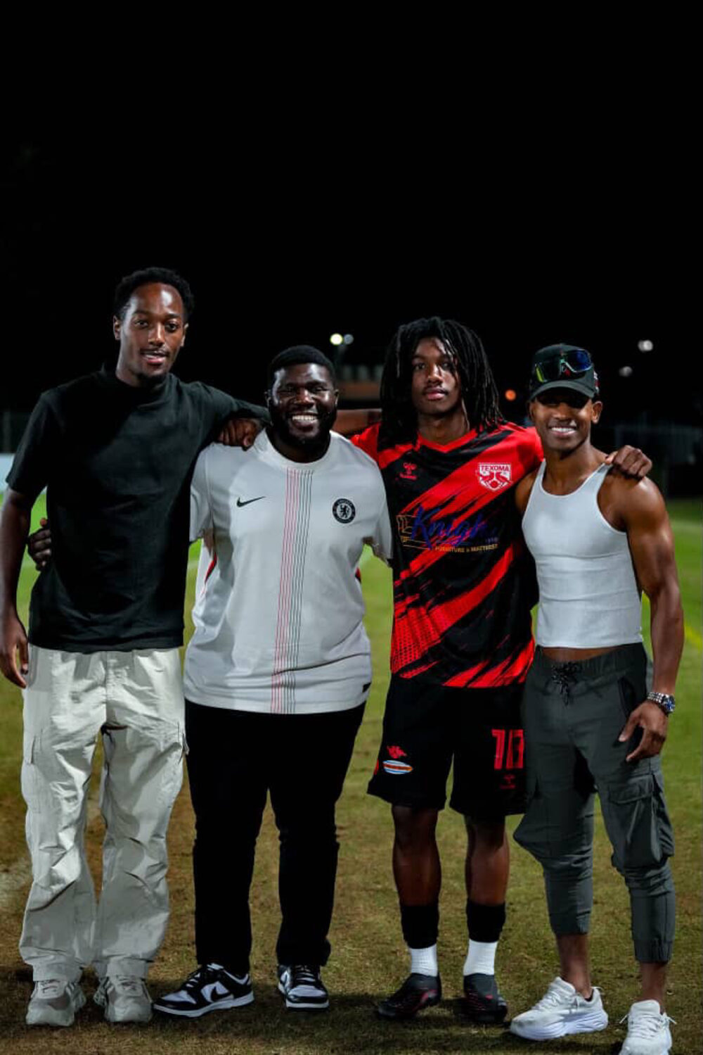 Kanou with players after a night match