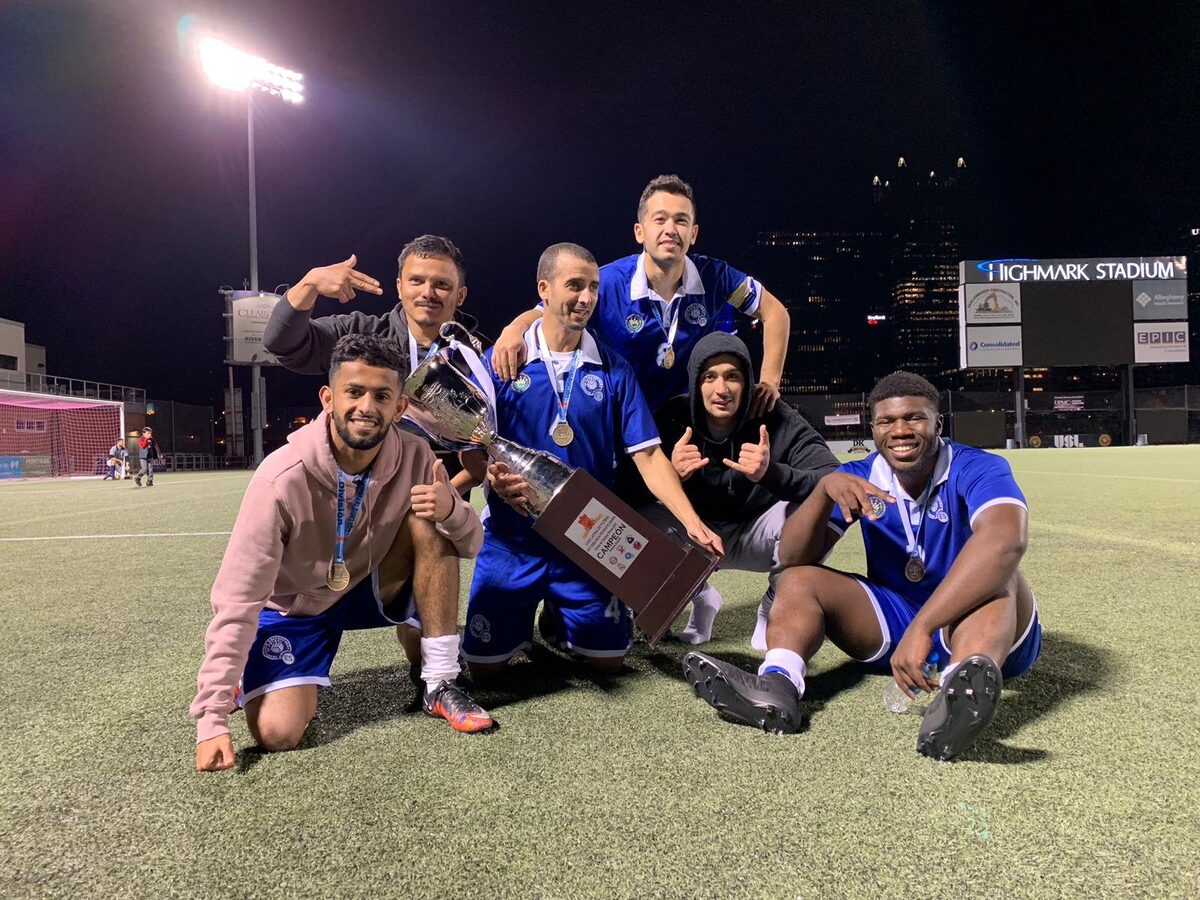 Trophy celebration with teammates
